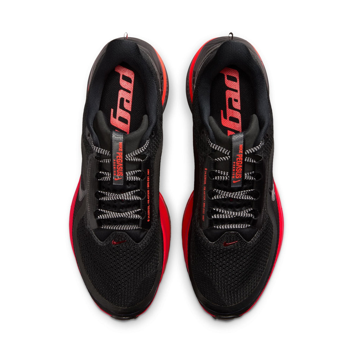 Nike men's Pegasus Premium running shoes in black with university red accents, featuring breathable mesh and cushioned sole.