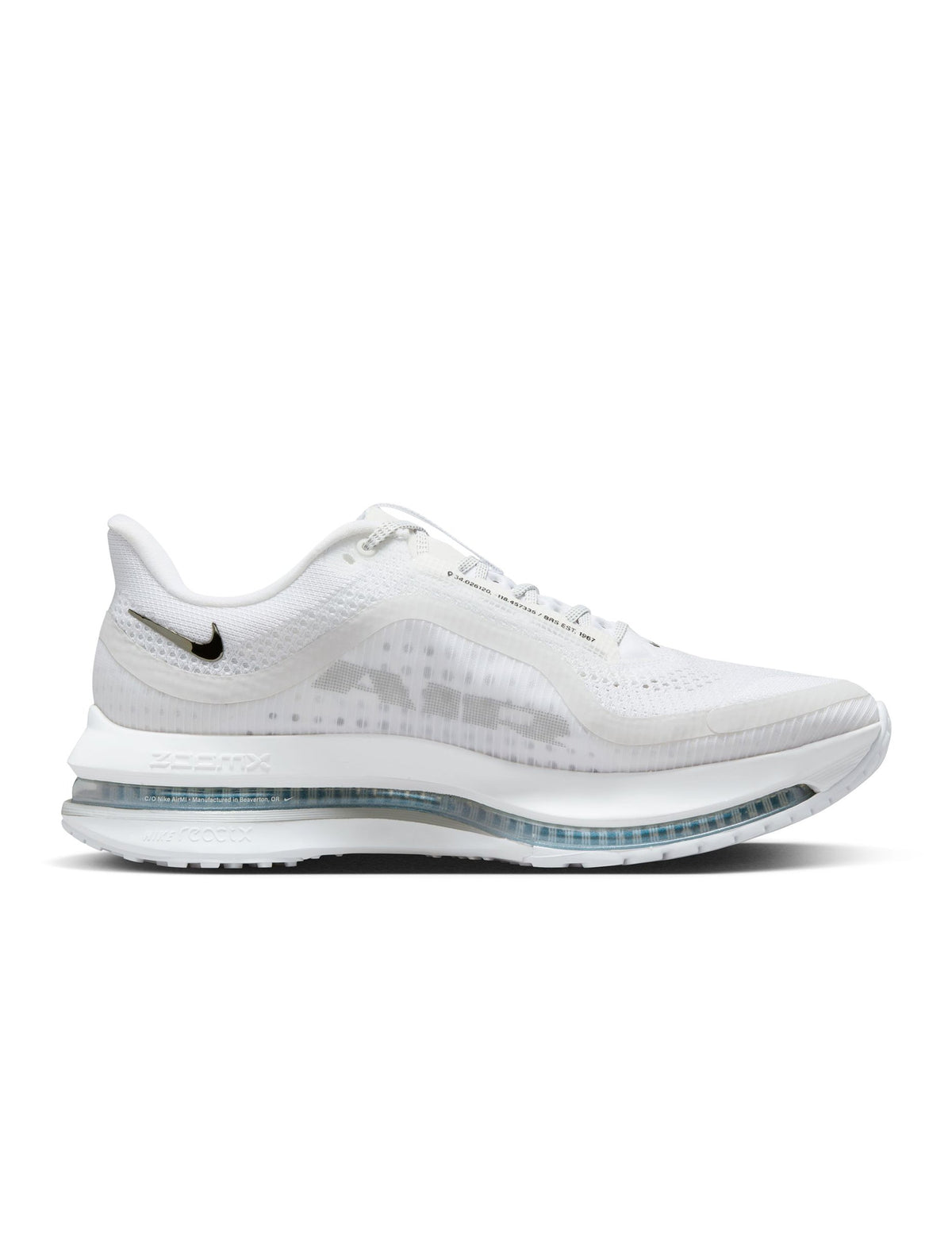 Nike men’s Pegasus Premium footwear in white with metallic silver details, side view
