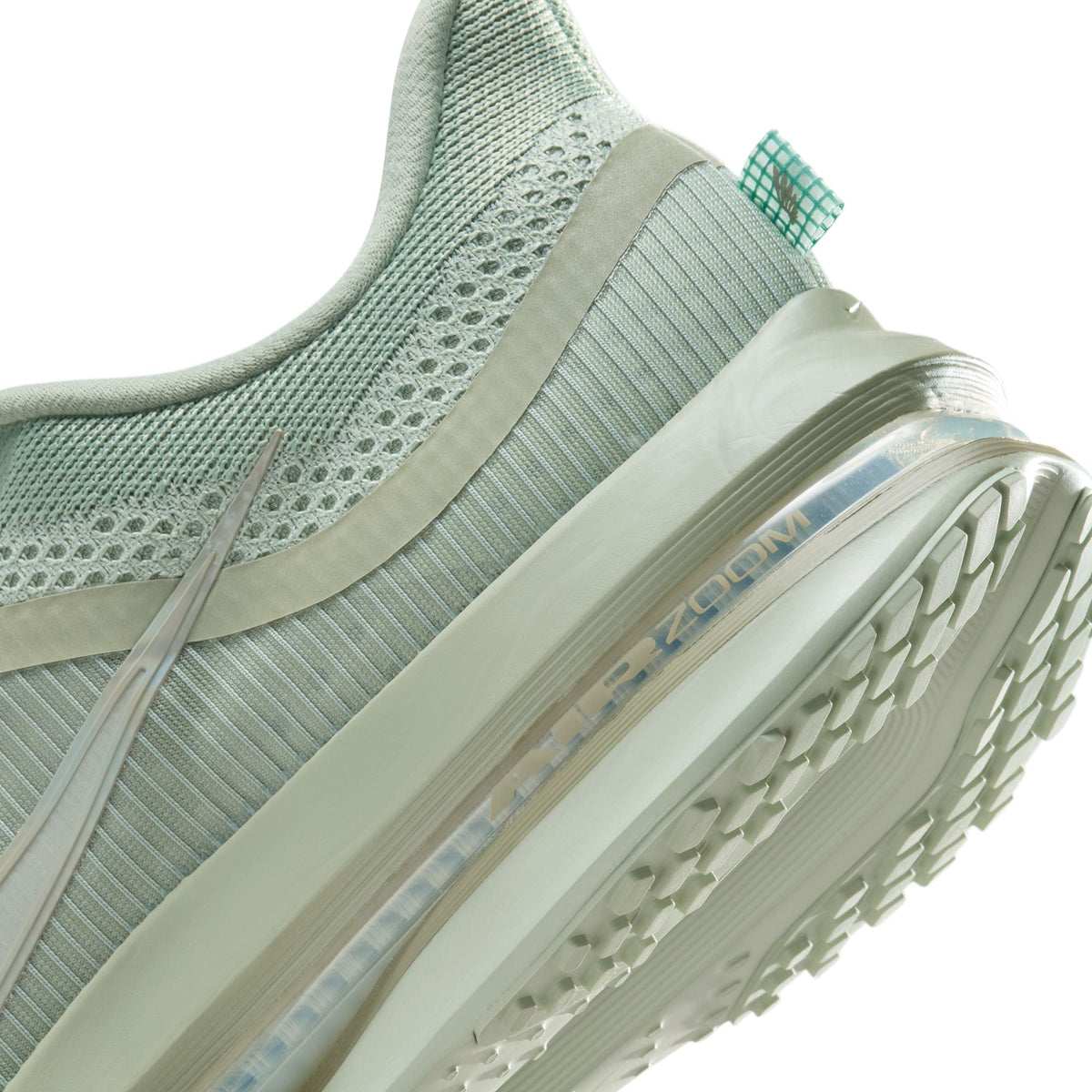 Nike Men's Pegasus Premium Jade Horizon footwear in green with cushioned running shoe design