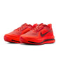 Nike men’s Pegasus Premium footwear in Light Crimson, side view sneaker with cushioned sole
