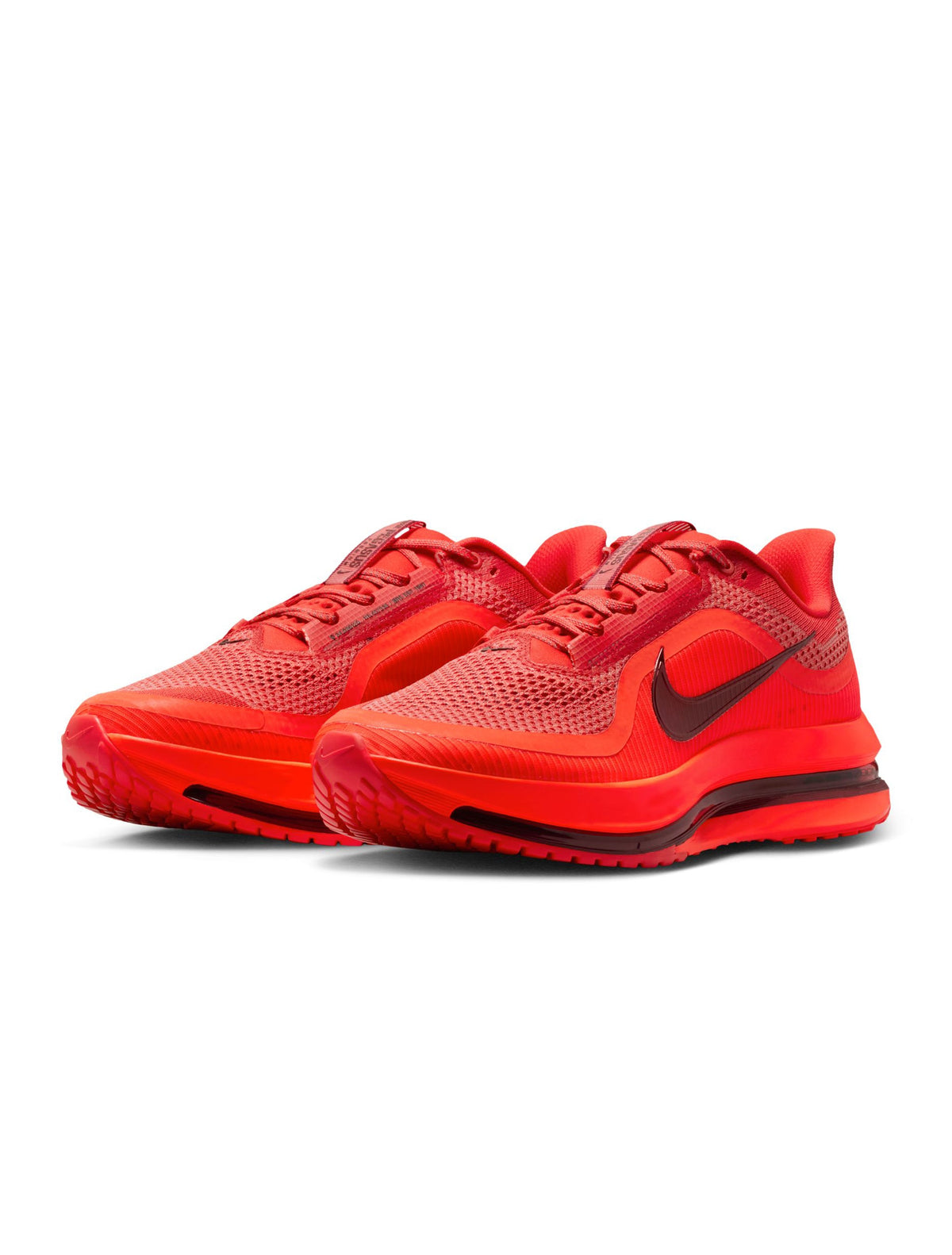 Nike men’s Pegasus Premium footwear in Light Crimson, side view sneaker with cushioned sole