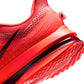 Nike men's Pegasus Premium footwear in Light Crimson, side view sneaker on a white background