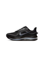 Nike women's Pegasus Premium black footwear side view with cushioned sole and lace-up design
