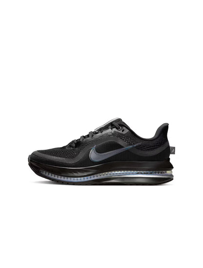 Nike women's Pegasus Premium black footwear side view with cushioned sole and lace-up design