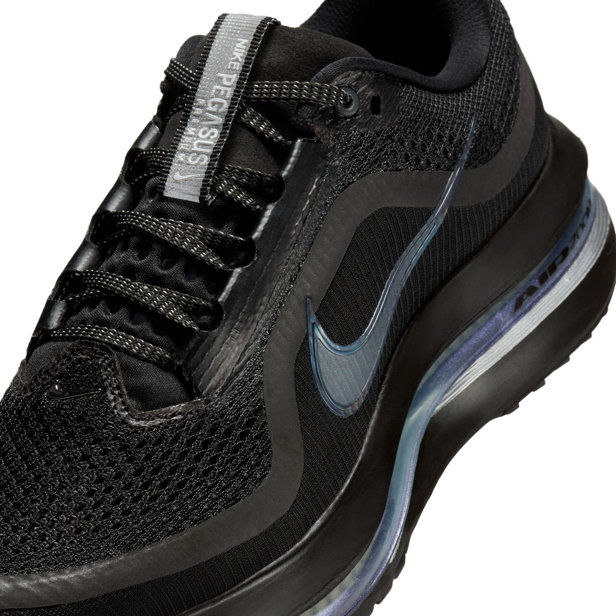 Black Nike women's Pegasus Premium running shoes viewed from the side