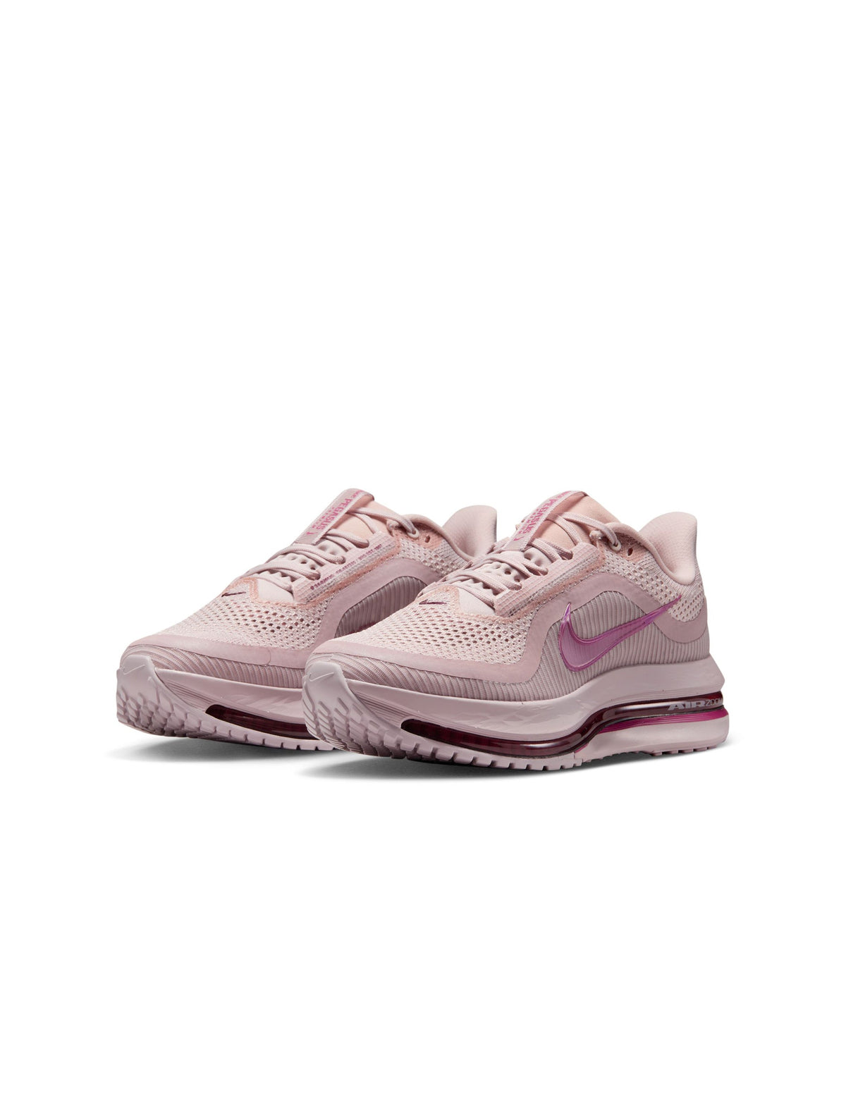 Nike Womens Pegasus Premium Silt Red running shoes with white accents, breathable mesh uppers, and cushioned soles.