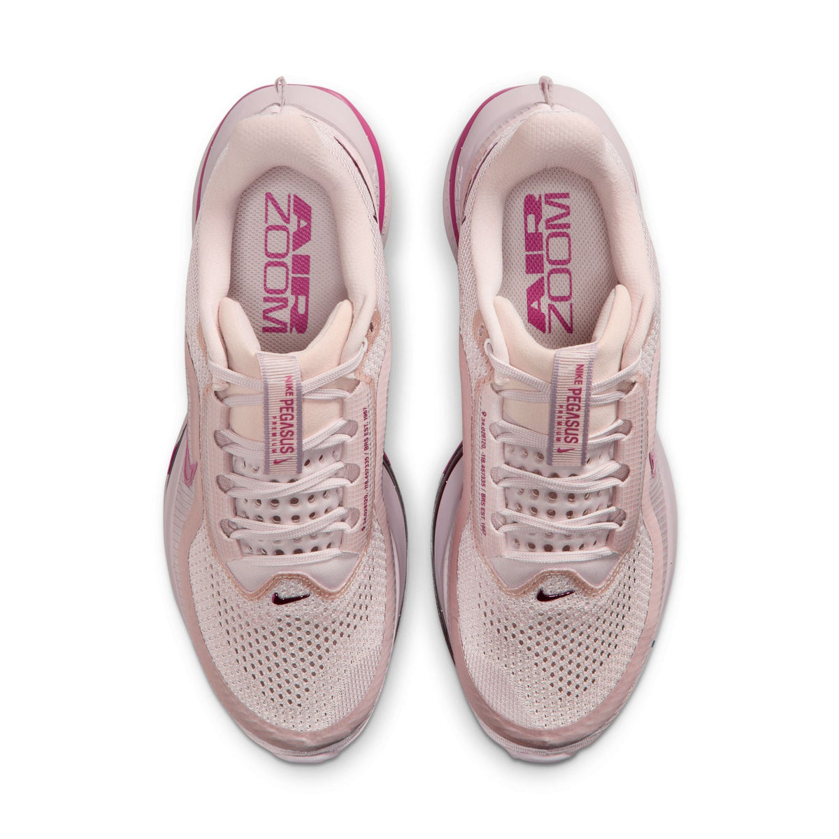 Nike Women's Pegasus Premium Silt Red running shoes with white Nike swoosh and supportive sole, outdoor setting.