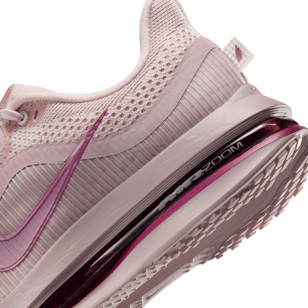 Nike Womens Pegasus Premium Silt Red running shoes with white soles and breathable mesh uppers, designed for comfort and style.