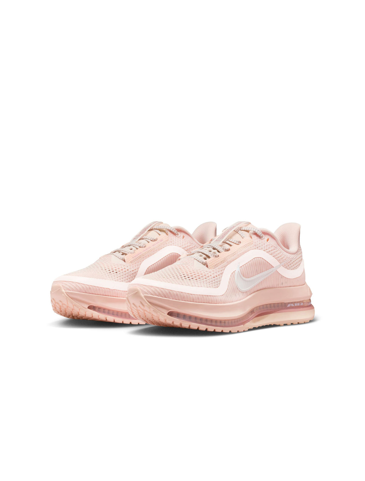 Nike Womens Pegasus Premium sneakers in Guava Ice color, featuring breathable design and athletic comfort.