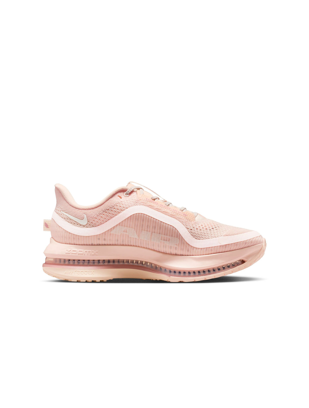 Nike Womens Pegasus Premium Guava Ice running shoes, pink and white athletic footwear with cushioned design and breathable material.