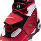 Nike men's Air Diamond Turf 2 Prime Red footwear in a bold red and black design