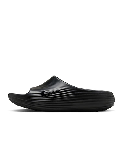 Black Nike Men's ReactX Rejuven8 footwear, side view.