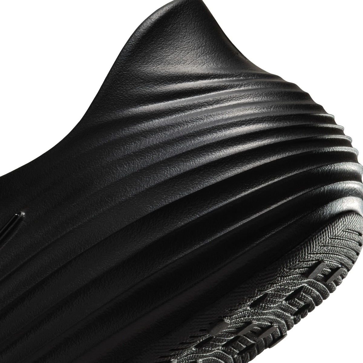 Nike Men's ReactX Rejuven8 Triple Black footwear in a sleek all-black design