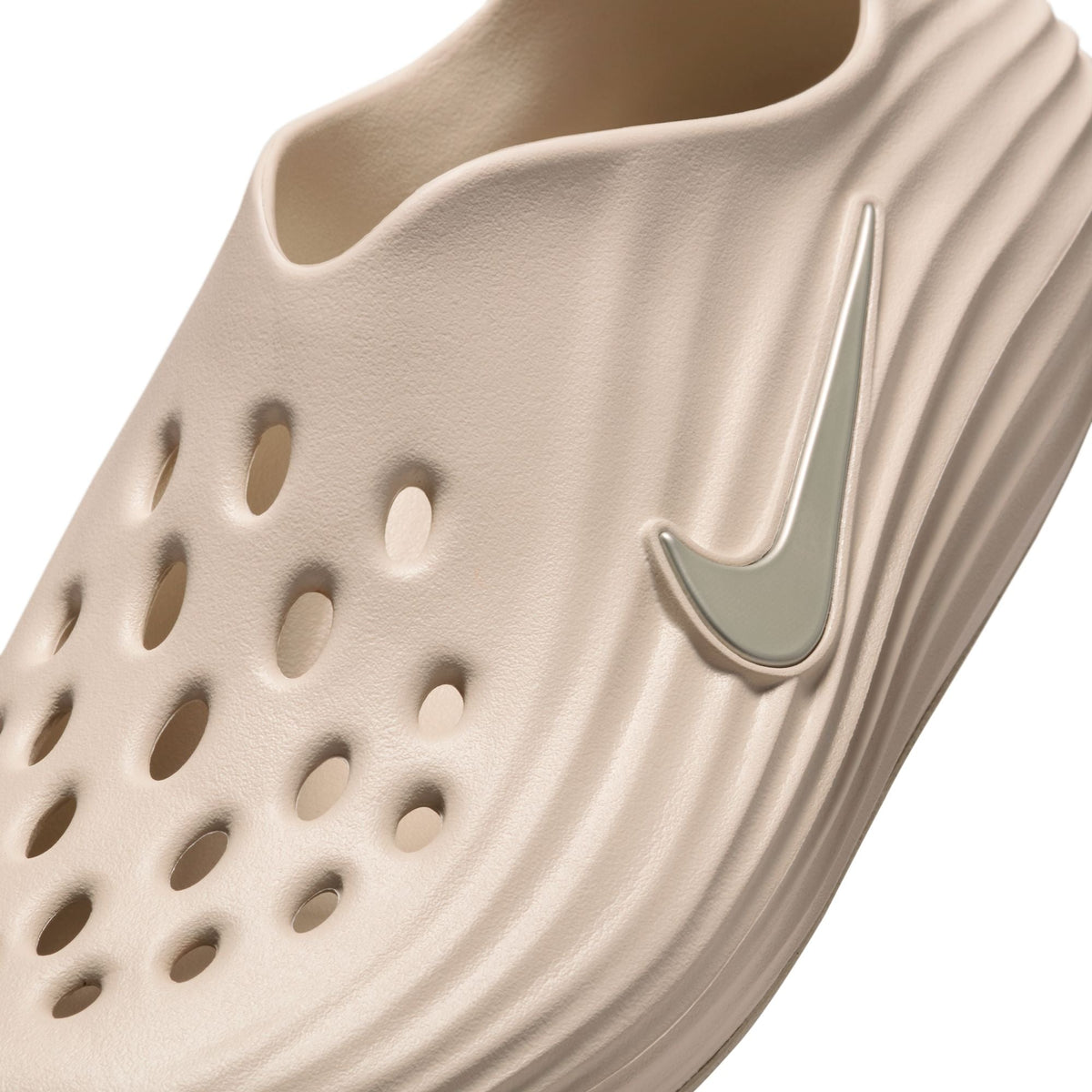 Nike Men's ReactX Rejuven8 Orewood footwear by Denim Exchange in a neutral slip-on design