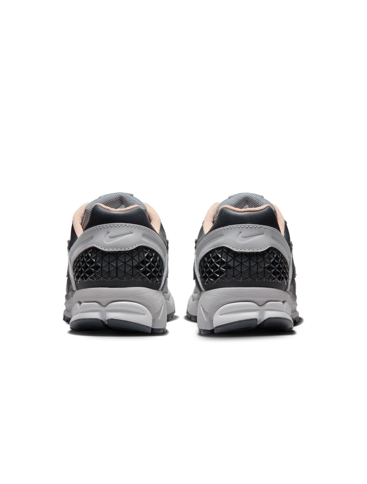 Nike men's Zoom Vomero 5 sneakers in Smoke Grey, side view showing mesh and layered panel design