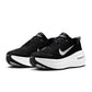 Nike Men's Vomero Plus black and white sneakers, side view