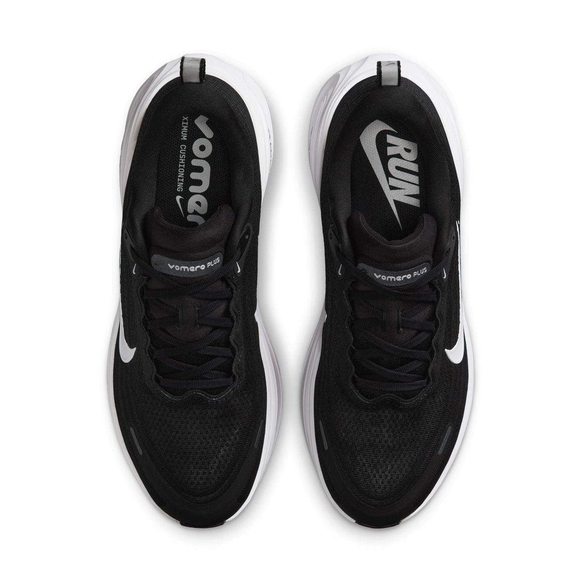 Nike Men's Vomero Plus black and white footwear with cushioned sole and breathable mesh upper