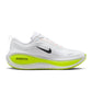 Nike men's Vomero Plus sneakers in white and barely volt, side view.