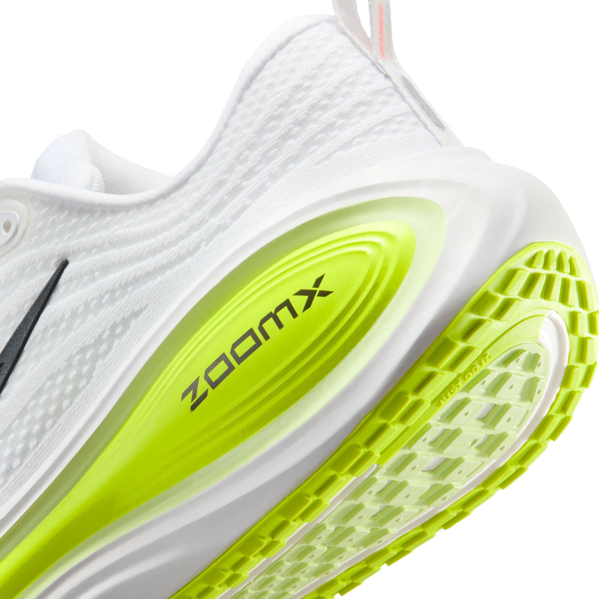 Nike men's Vomero Plus footwear in white and barely volt with cushioned running shoe design