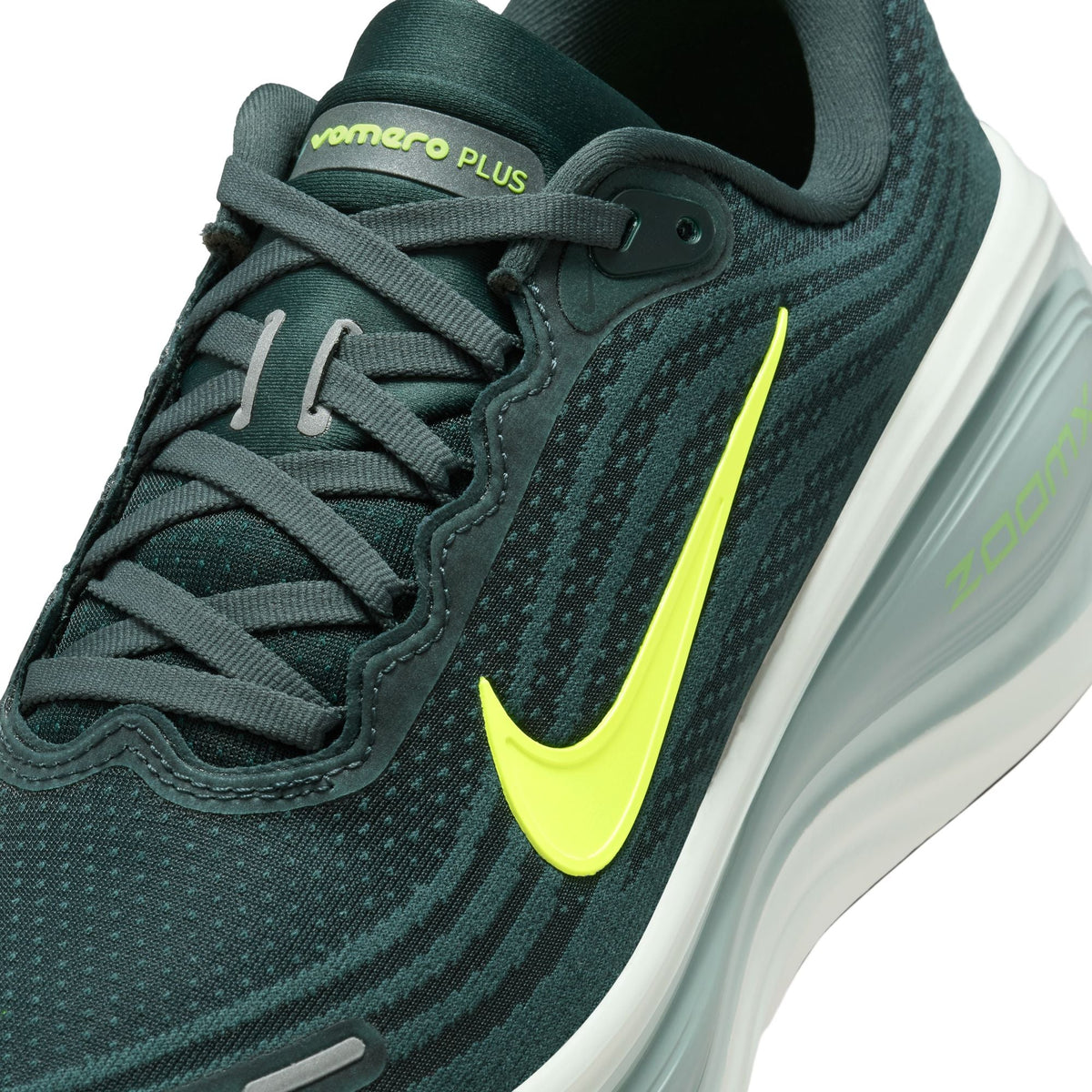 Nike Men's Vomero Plus seaweed sneakers by Denim Exchange in side view