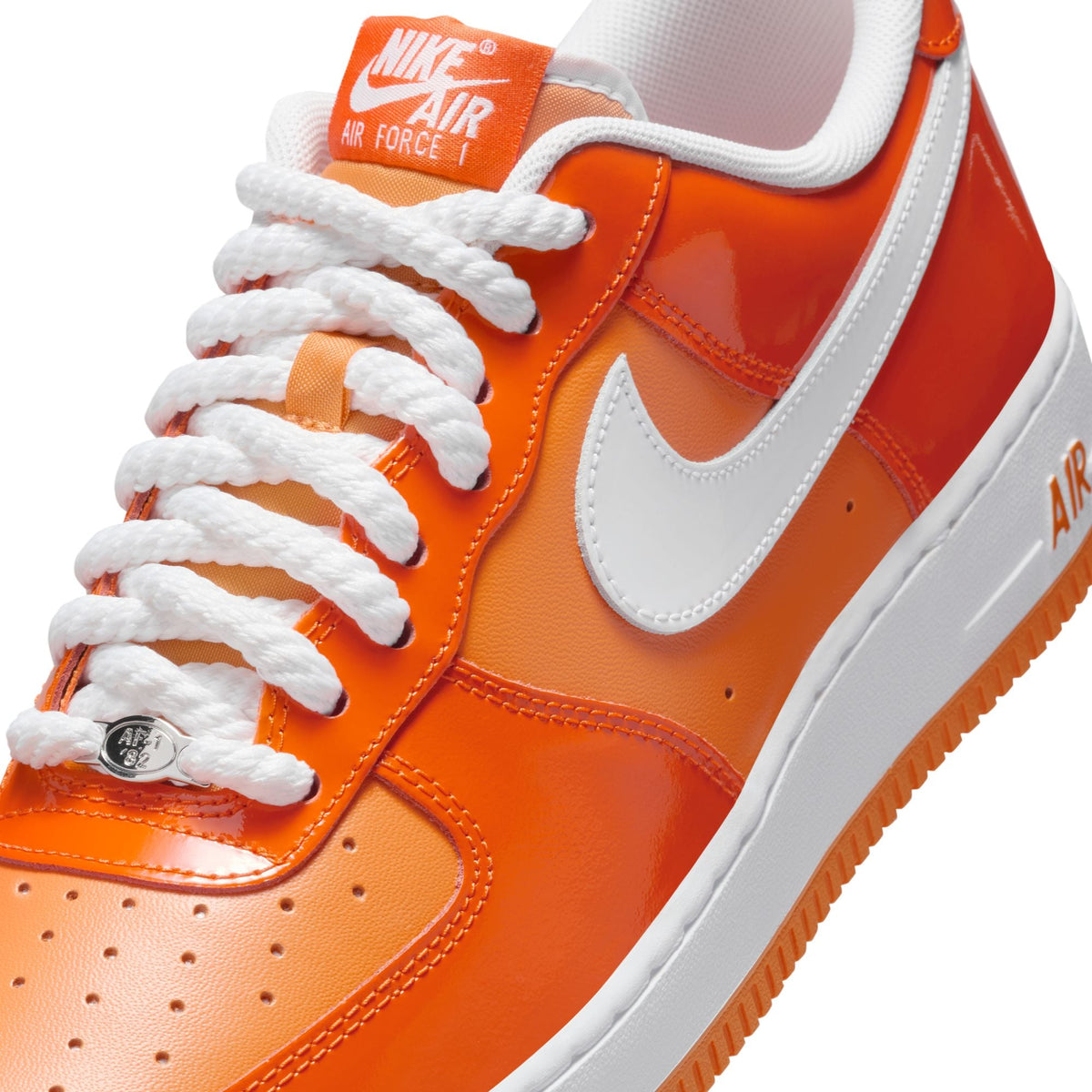 Men's Nike Air Force 1 '07 LV8 footwear in Safety Orange, side view sneaker