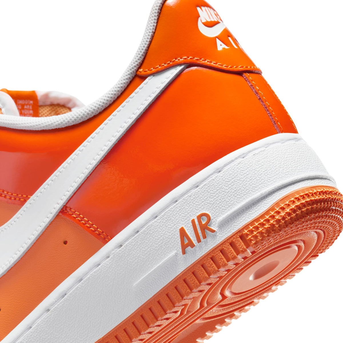 Nike Men's Air Force 1 '07 LV8 sneakers in Safety Orange, side view