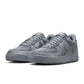 Nike men's Kobe Air Force 1 Low sneakers in Wolf Grey, featuring a sleek low-top design and Nike branding.
