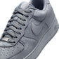 Nike men's Kobe Air Force 1 Low sneakers in Wolf Grey, shown in a close-up of the stylish men's footwear.