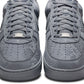 Nike men's Kobe Air Force 1 Low sneakers in Wolf Grey, casual footwear with a sleek design and comfortable fit.