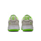 Nike men's Kobe Air Force 1 Low sneakers in electric green, featuring a sleek design and iconic branding.