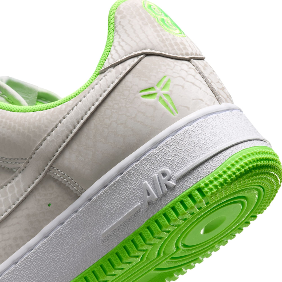 Nike men's Kobe Air Force 1 Low sneakers in electric green, with a sleek low-top design and vibrant colorway.