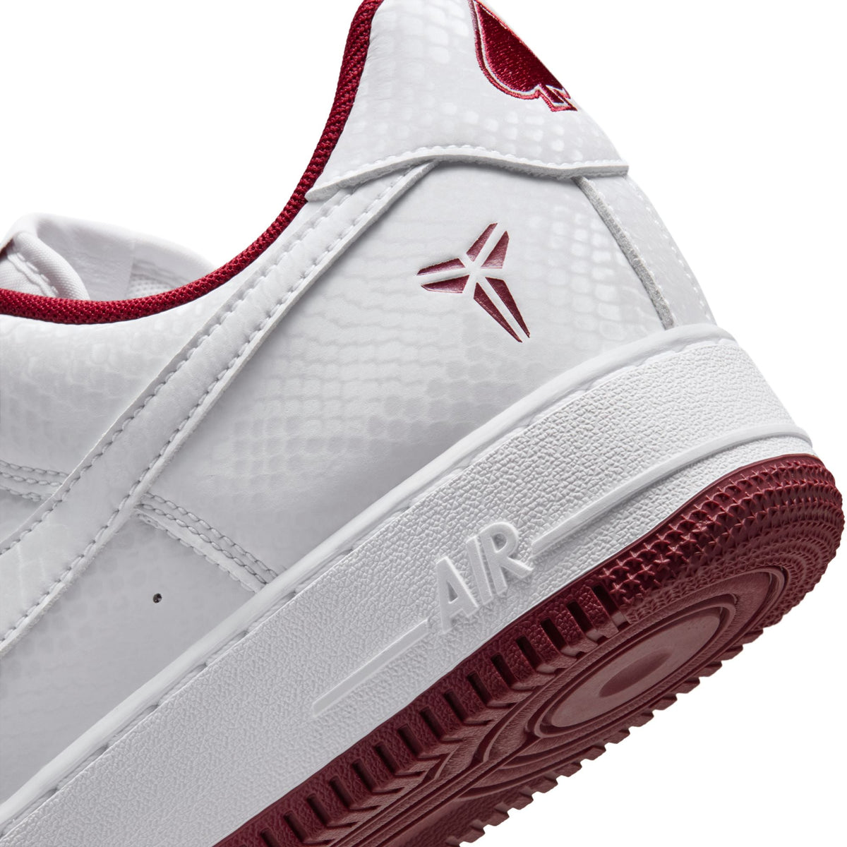 Nike men's Kobe Air Force 1 Low sneakers in white and team red, showcasing the stylish design and classic silhouette.