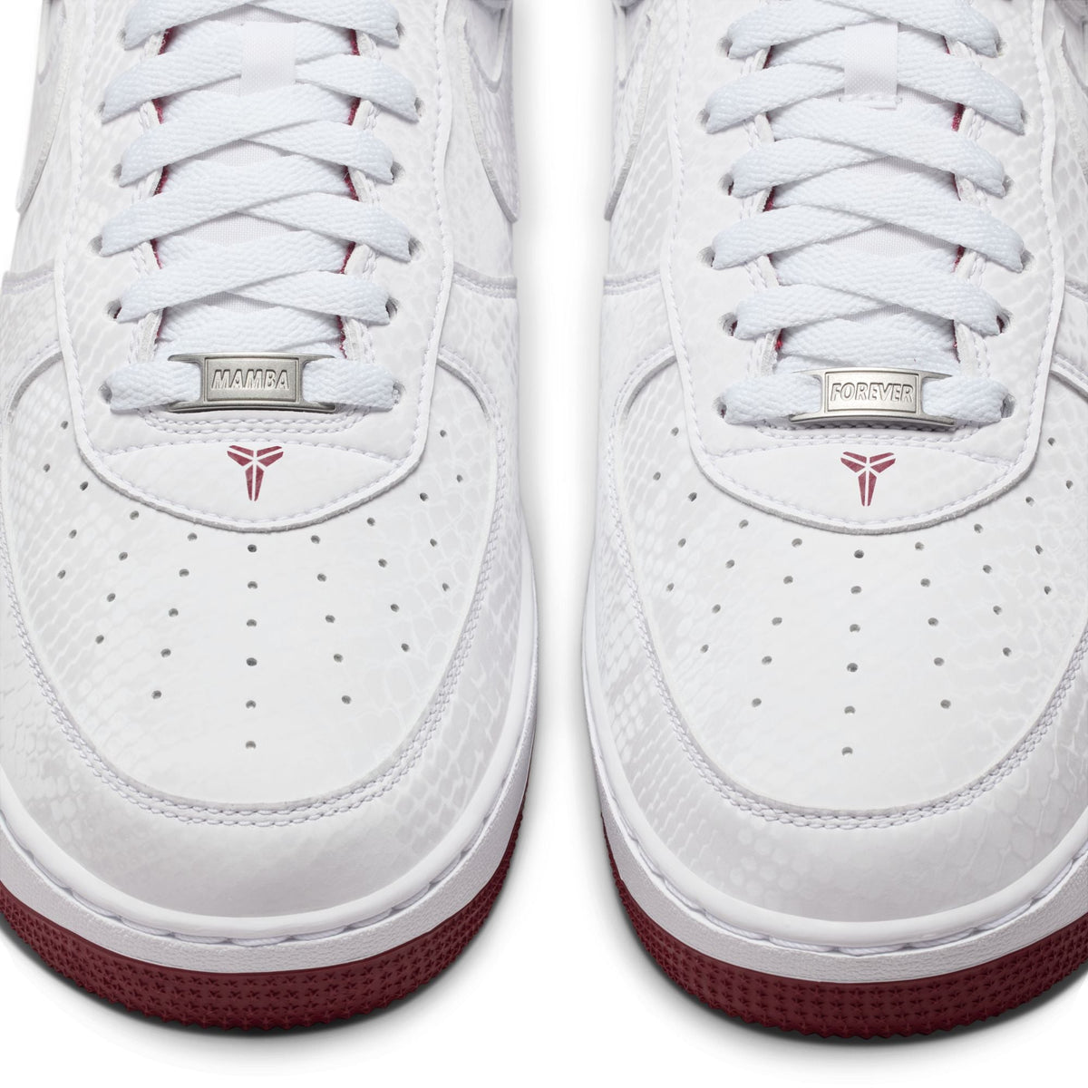 Nike men's Kobe Air Force 1 Low sneakers in white and team red, featuring a classic low-top design and stylish Nike branding.