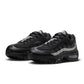 Nike men's Air Max 95 "Big Bubble" sneakers in black and metallic silver featuring layered design and visible Air Max units.