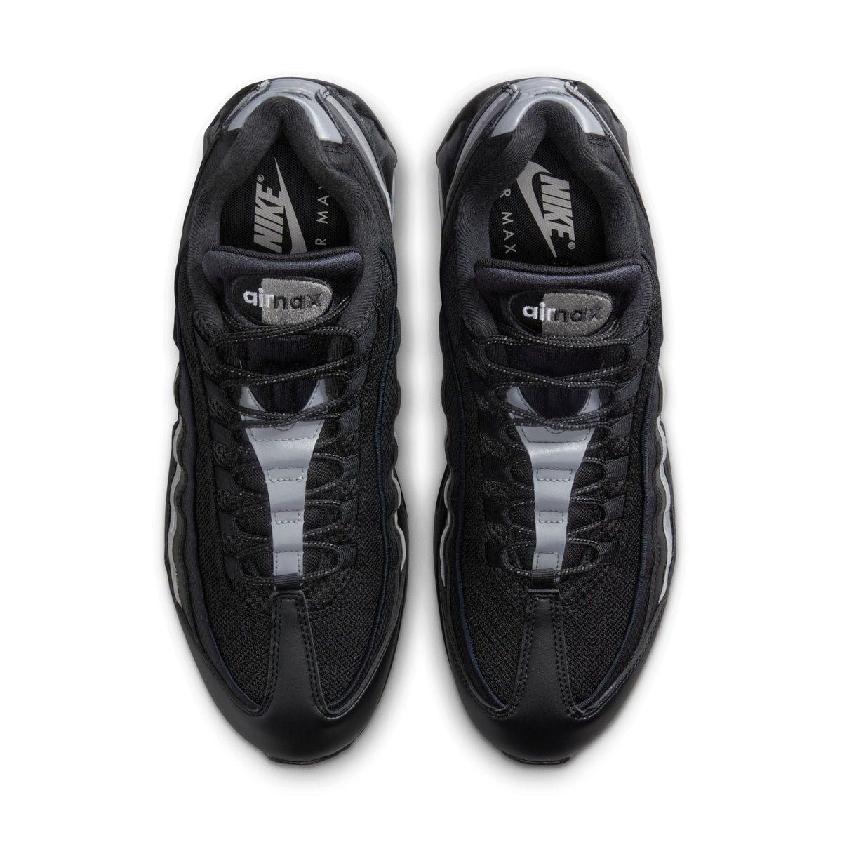 Nike Air Max 95 men's footwear in black with metallic silver accents, showcasing the iconic design and cushioning detail.