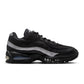 Nike Mens Air Max 95 Big Bubble black and metallic silver sneakers, showcasing the stylish athletic footwear design.