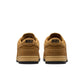 Nike Men's Dunk Low Retro SE Wheat sneakers, low-top footwear in tan and yellow with signature Swoosh design