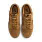 Nike Men's Dunk Low Retro SE Wheat sneakers in a low-top design, shown from the side
