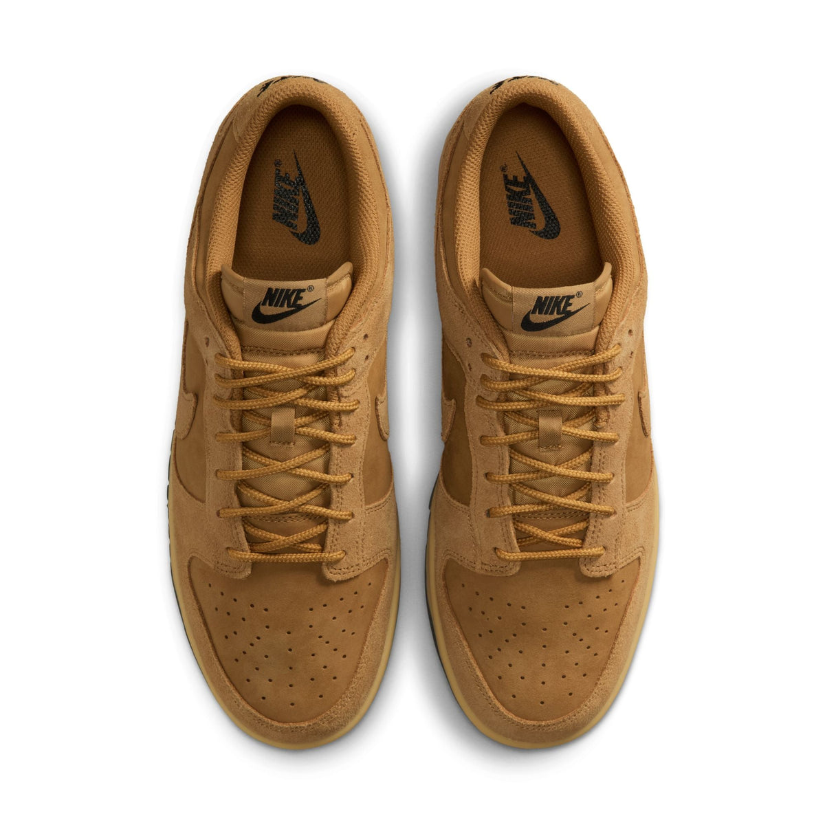 Nike Men's Dunk Low Retro SE Wheat sneakers in a low-top design, shown from the side