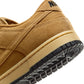 Denim Exchange men’s Nike Dunk Low Retro SE sneakers in wheat colorway with low-top design