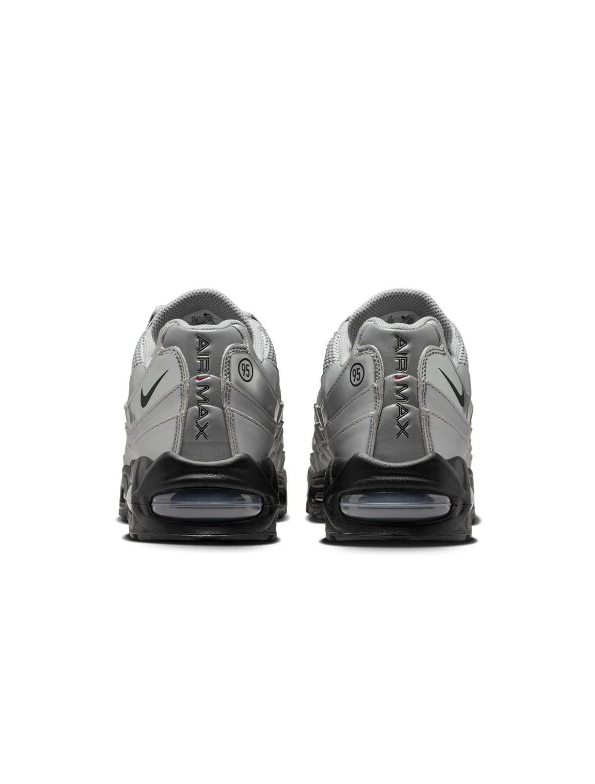 Nike men's Air Max 95 sneakers in metallic silver, side view.