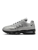 Men's Nike Air Max 95 sneakers in metallic silver with layered panels and visible Air cushioning
