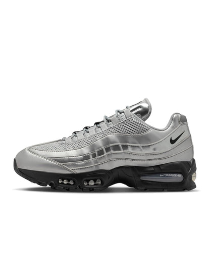 Men's Nike Air Max 95 sneakers in metallic silver with layered panels and visible Air cushioning
