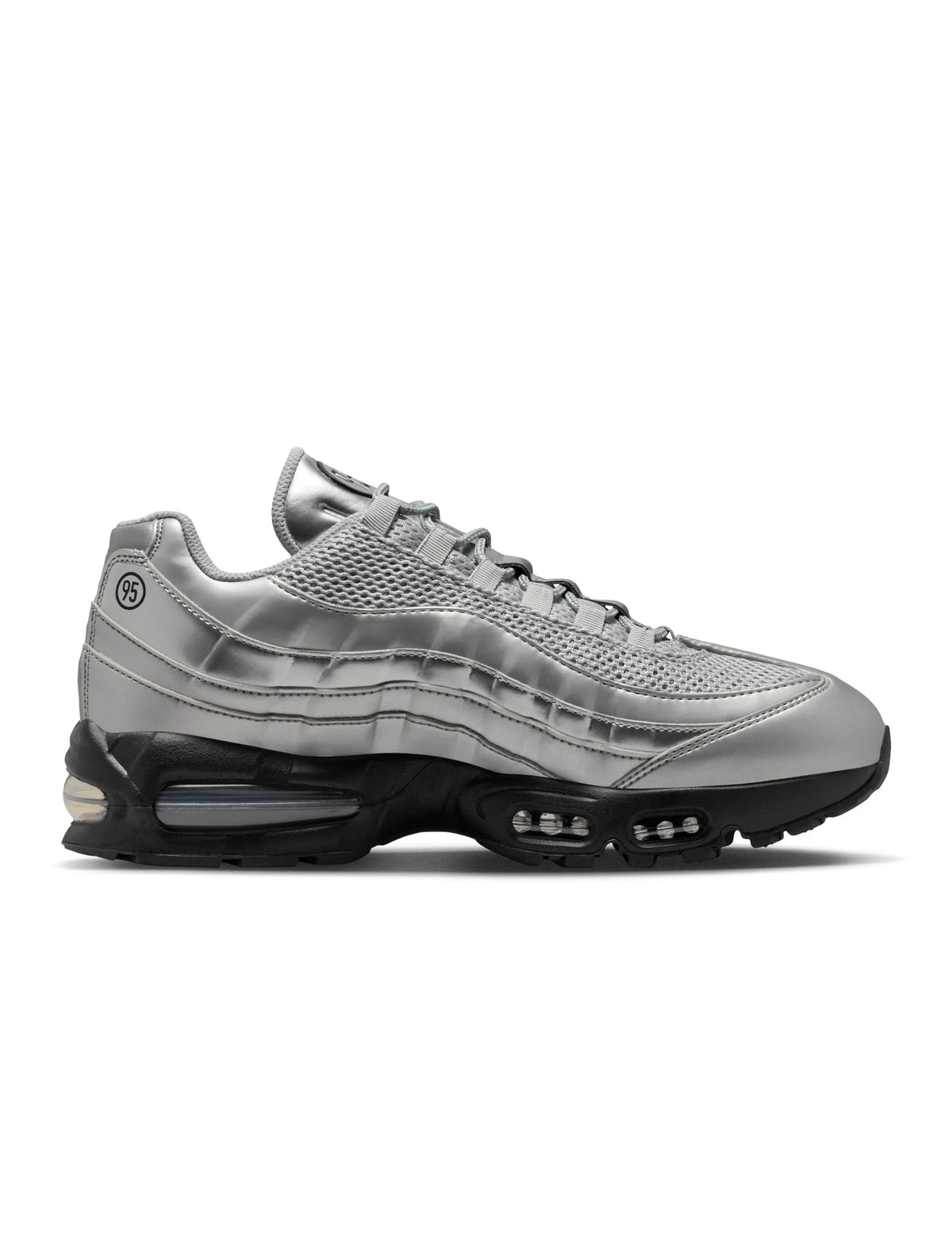 Men's Nike Air Max 95 sneakers in metallic silver with layered panels and visible Air cushioning