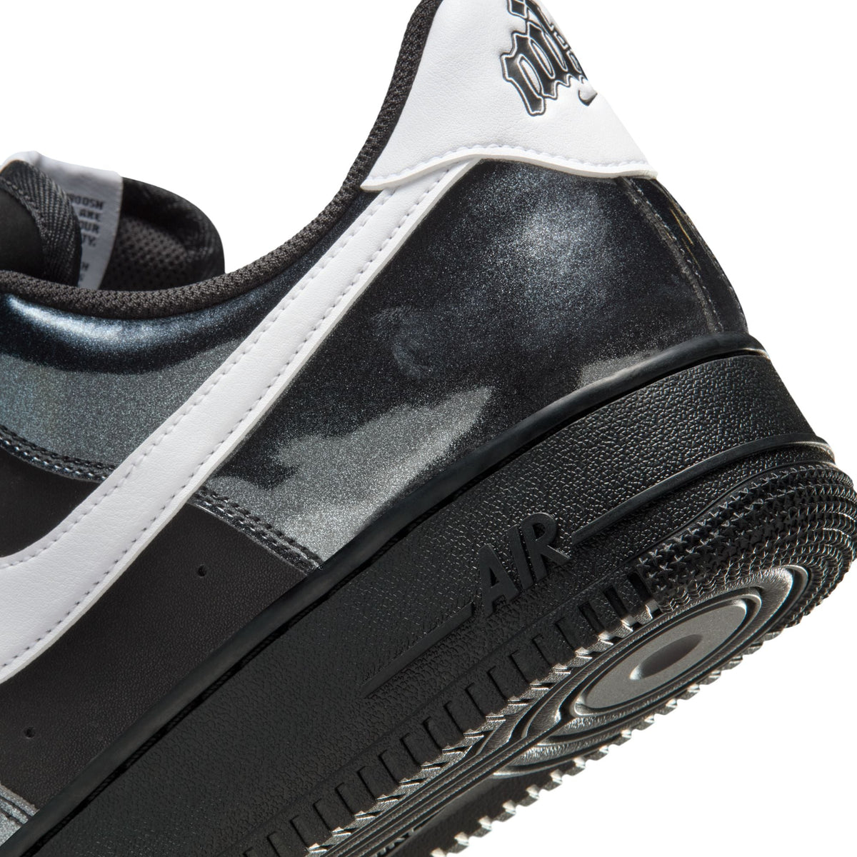 Denim Exchange men's Nike Air Force 1 '07 LV8 sneakers in black and white