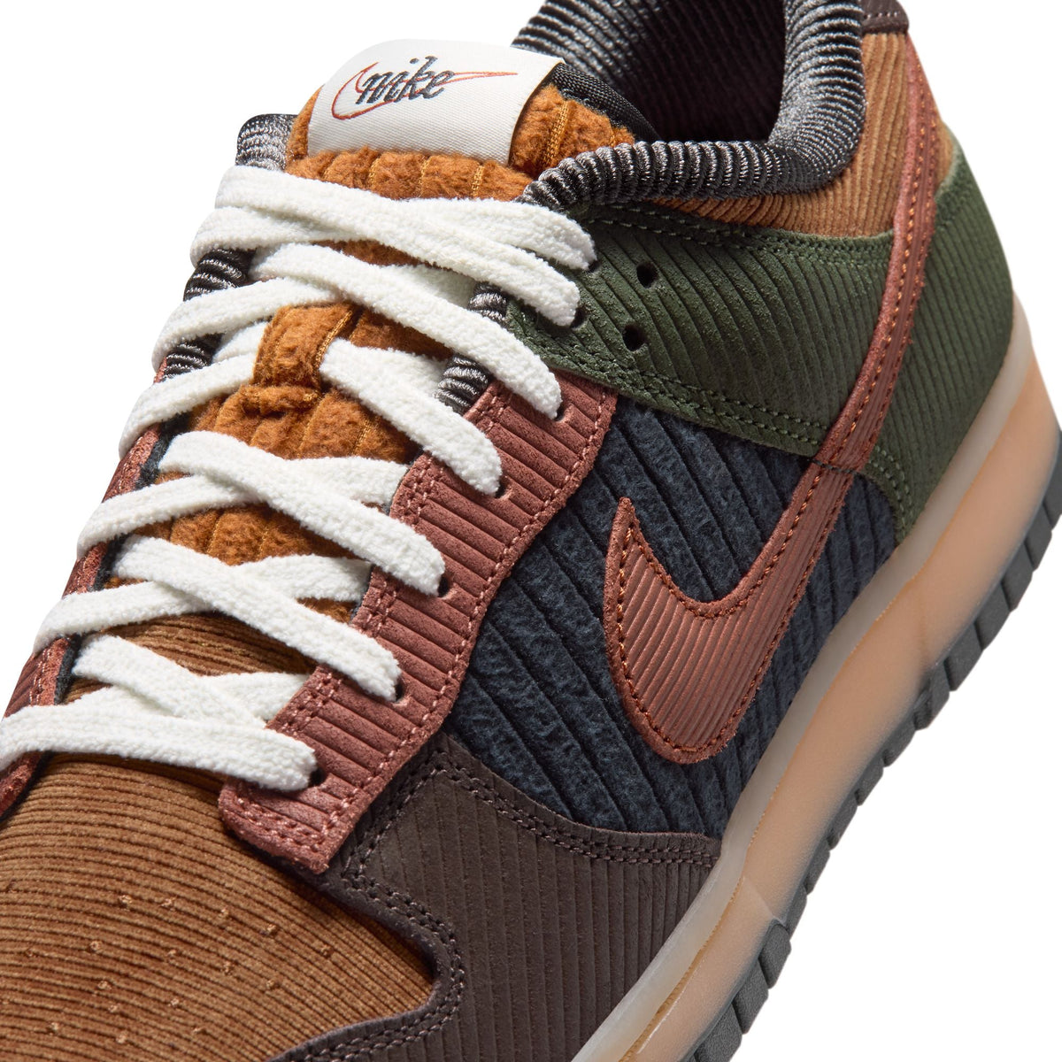 Nike Mens Dunk Low Retro Premium sneakers in British Tan, featuring classic low-top design and premium leather upper.