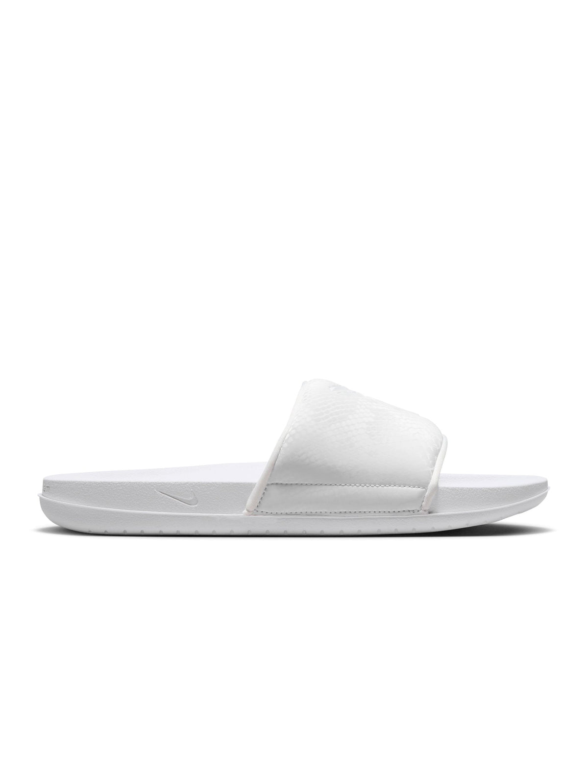 Nike Men's Kobe Offcourt Slides in white; side view of cushioned slip-on footwear with branded strap