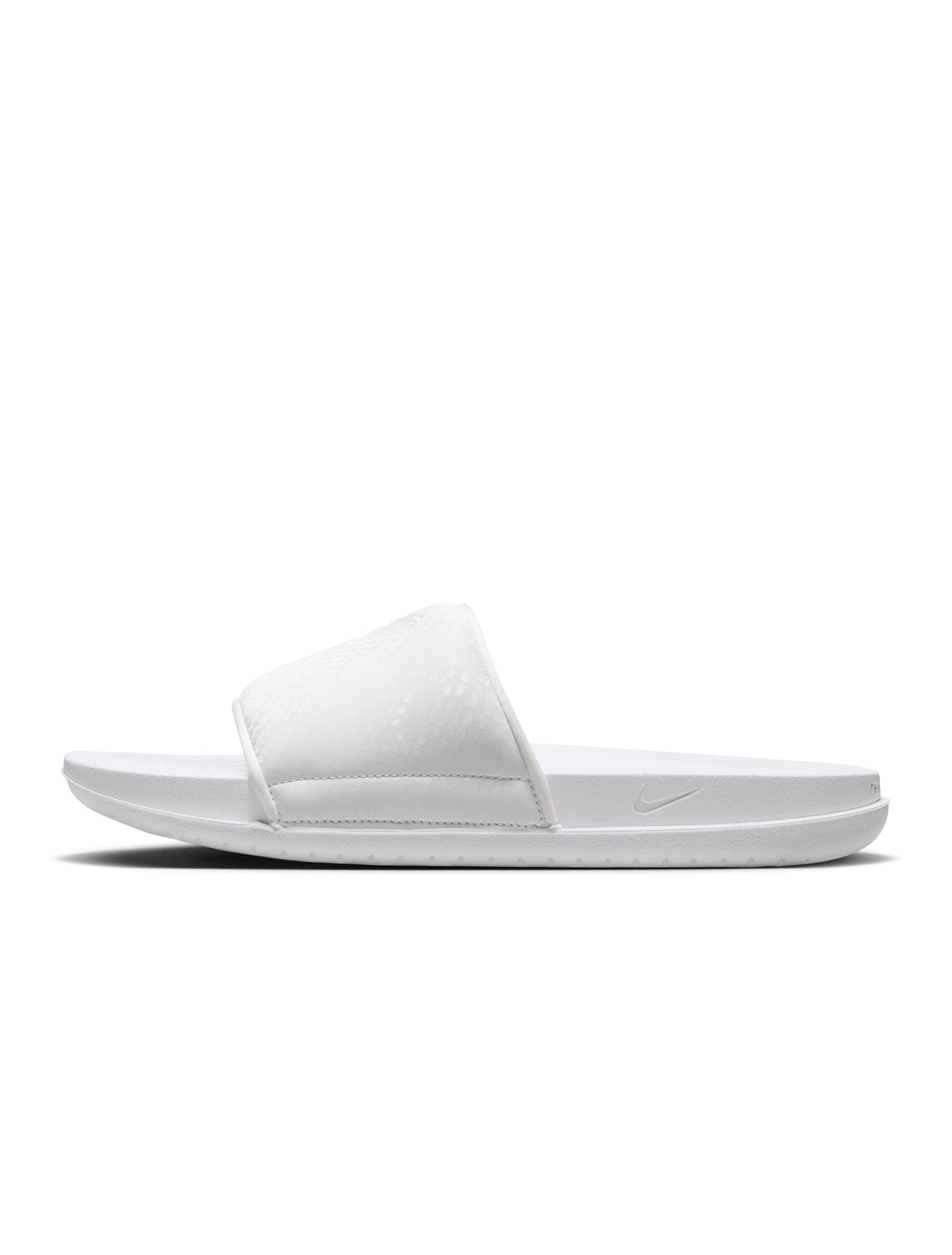 Nike men's Kobe Offcourt slides in white, shown from the side.