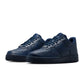 Men's Nike Air Force 1 '07 sneakers in Obsidian color, featuring classic design and white sole on a neutral background.