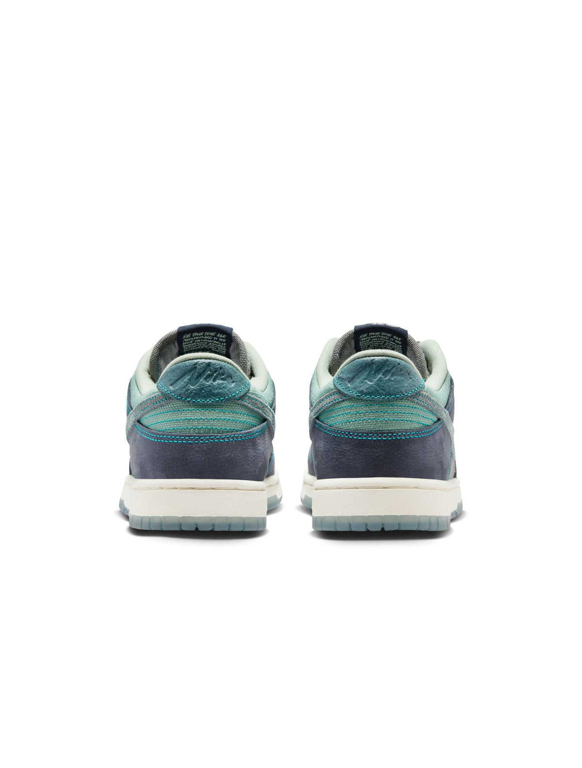 Men's Nike Dunk Low Retro SE sneakers in Pencil Point colorway, side view, by Denim Exchange